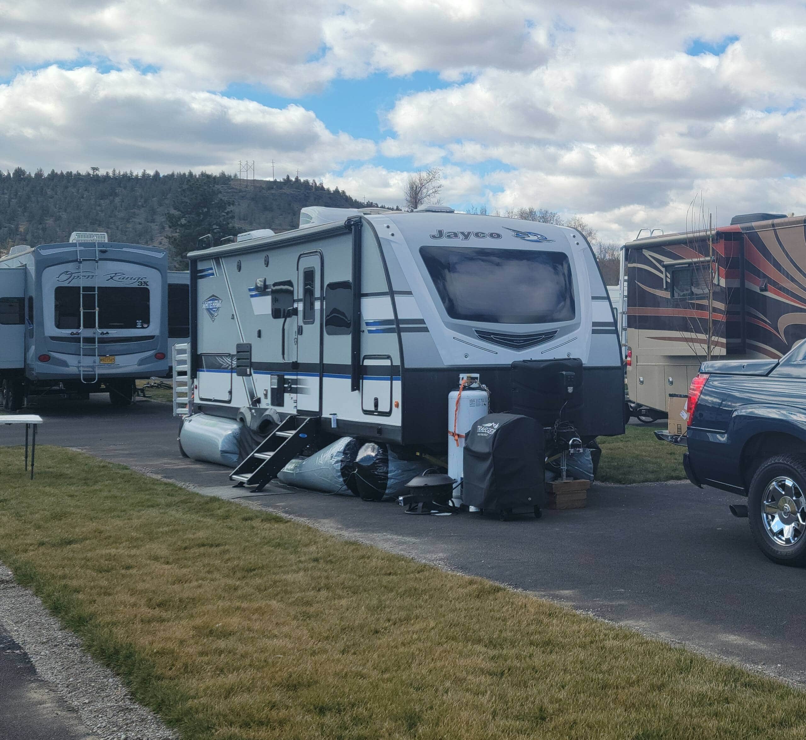 travel trailer skirting on Jayco White Hawk 23 mrb on cloudy day
