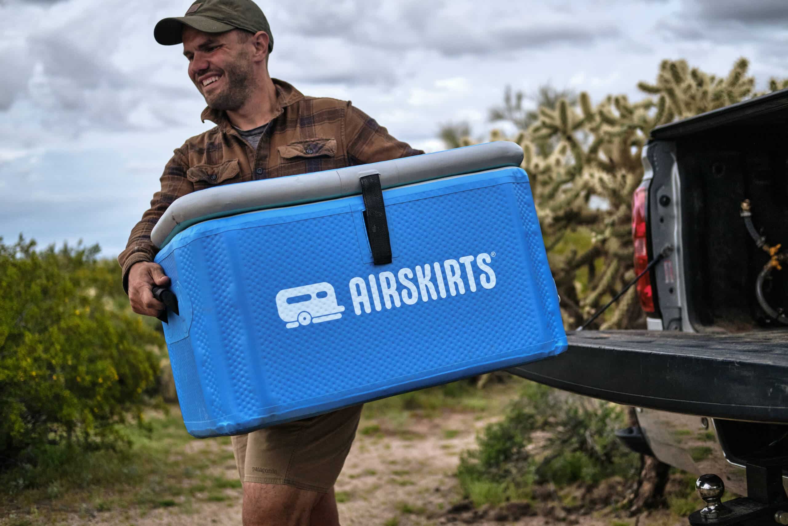 Man carries inflatable cooler