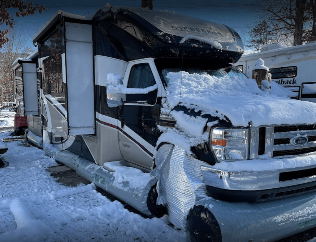 class c rv skirting on winnebago super c covered in snow